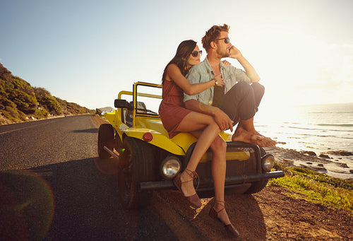 Loving young couple on road trip