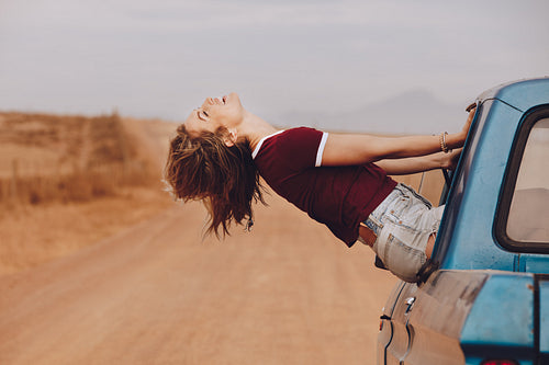 Woman enjoying the car ride
