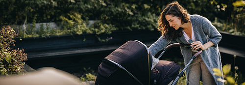 Woman with her baby in stroller