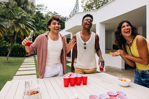 Beer pong party with friends outdoors