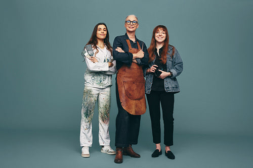 Diverse women from different creative occupations standing in a