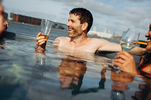 A waterfront spa brings friends together with drinks and conversation.
