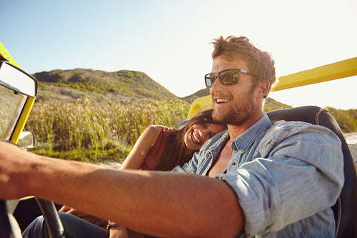 Loving couple enjoying on a road trip
