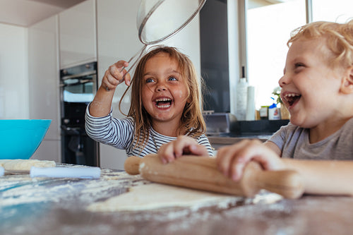 Kids having fun while making cookies