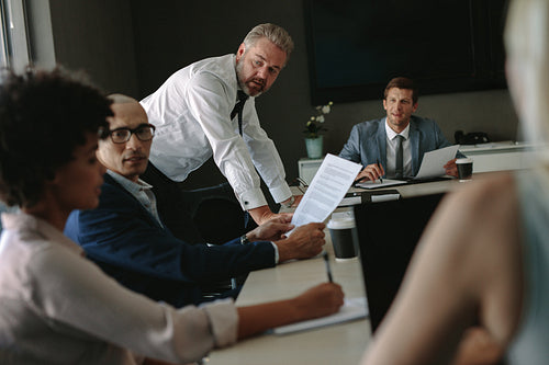 Multi-ethnic business team having meeting on conference room