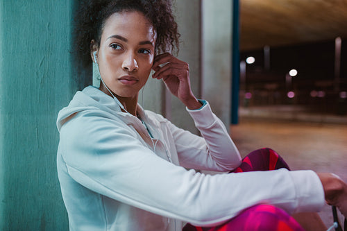 Sportswoman taking break from workout
