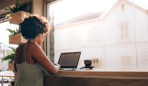 Woman spending time at a coffee shop