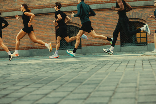 Workout pace leads this running group through the city