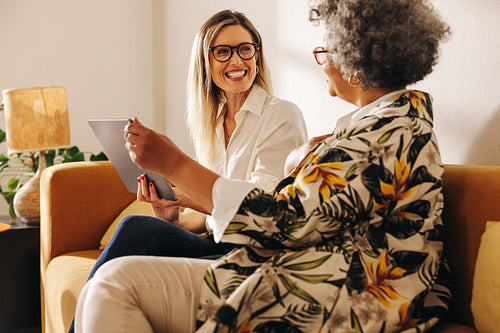 Smiling businesswomen working together in a modern office