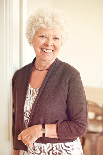 Cheerful Old Lady at Home Standing