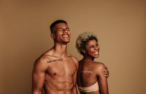 Happy african american couple standing together