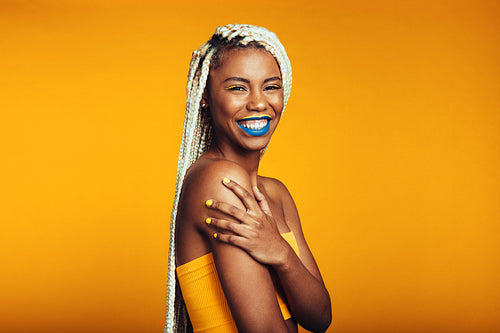 Side view of smiling fashionable woman