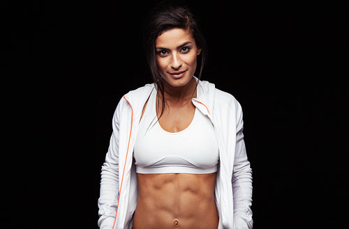 Beautiful young woman in sports clothing 