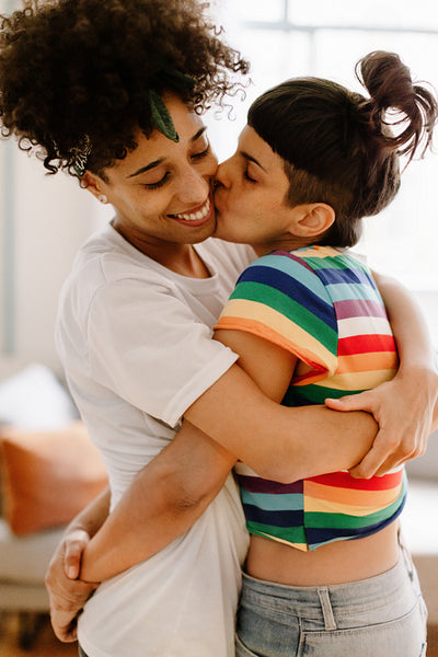 LGBTQ+ couple embracing each other