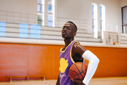 In his zone: Teen basketball player stares down the lens