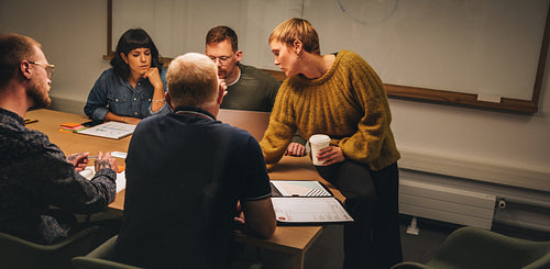 Business professionals having project discussion meeting