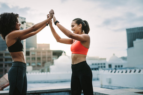 Fitness women celebrating after workout
