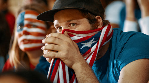 USA soccer fans watching the match closely at stadium