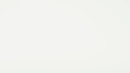 Contactless payment being made with a credit card at a modern payment terminal