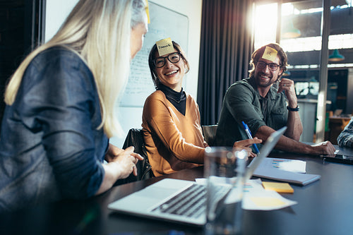 Happy business team during a brainstorming meeting