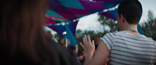 Friends enjoying a music festival together