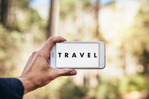 Close up of a hand holding smart phone