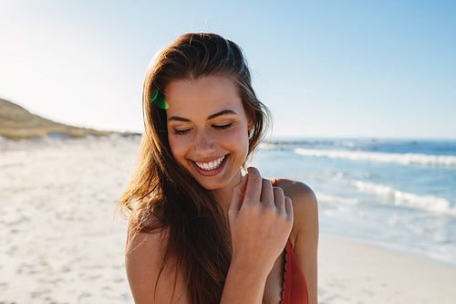Sensual young woman on the beach