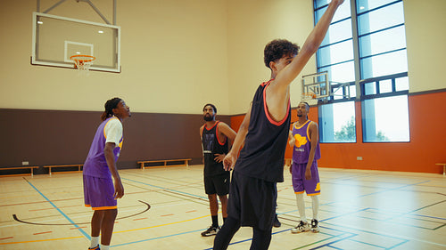 Joyful basketball team celebrates victory