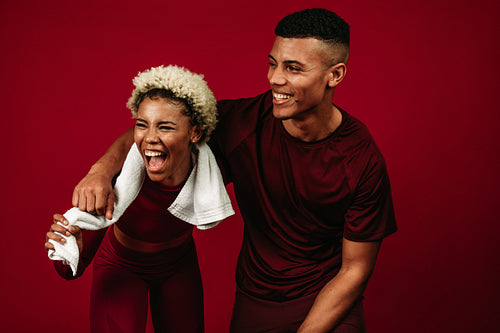 Close up of fitness man and woman enjoying after workout