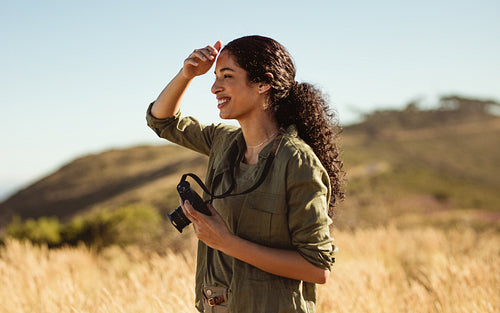 Tourist woman with a camera