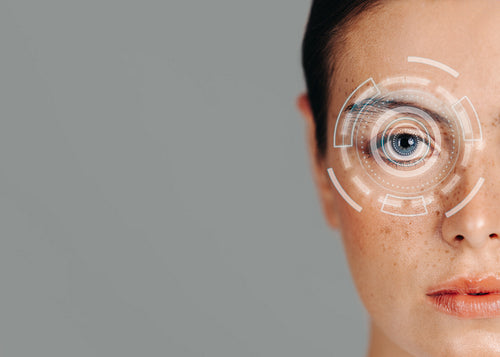 Iris identification. Artificial intelligence system doing a biometric scan on a woman’s eyes