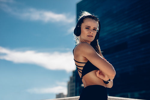 Woman taking rest after running session