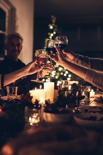 Family toasting at christmas dinner