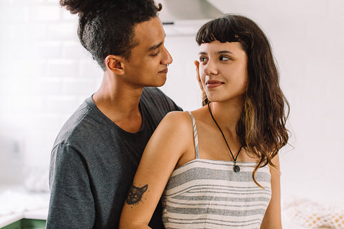 Cute couple sharing a romantic moment at home