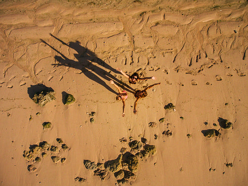 Women friends having fun on beach vacation.