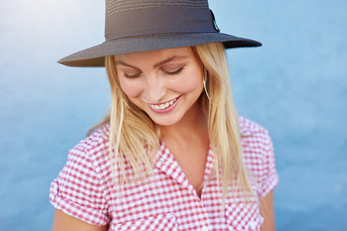 Beautiful young woman with hat