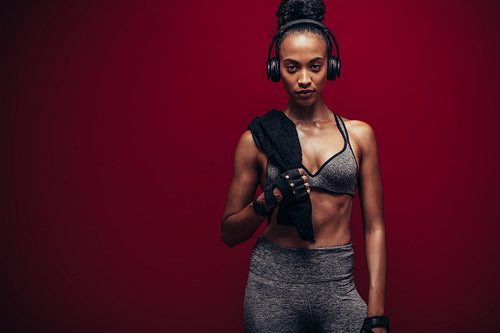 African female athlete resting after her workout