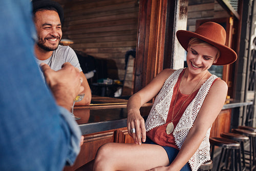 Young friends having fun at a cafe
