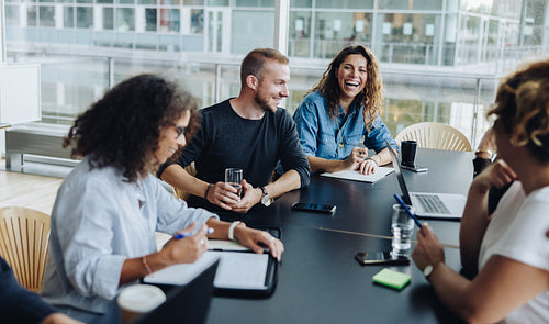 Business people smiling after a productive meeting