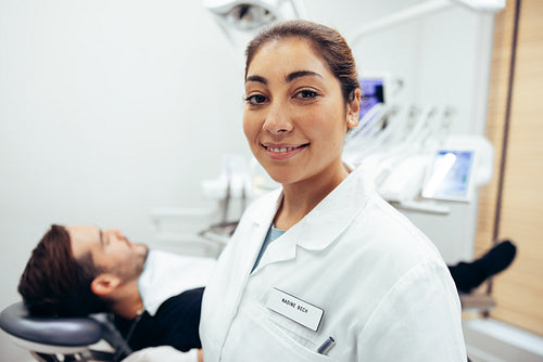 Female dental expert in her clinic