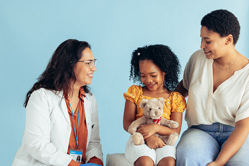 Pediatrician examining a patient