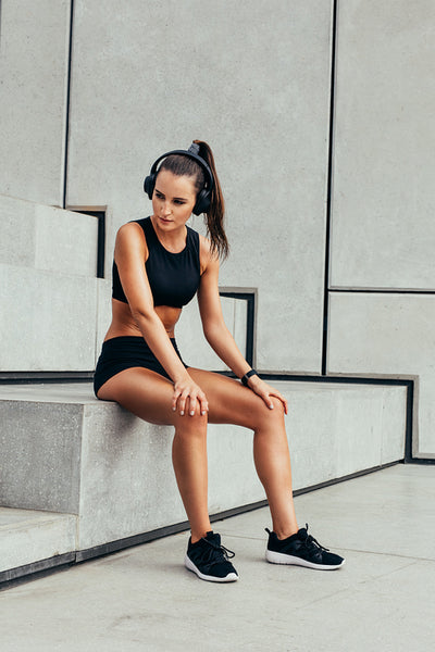 Woman taking break after exercising session