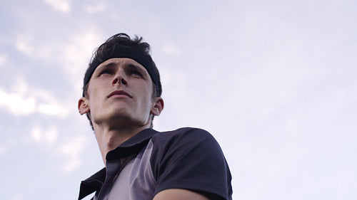 Professional tennis player ready for serving the ball