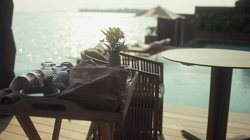 Delicious in-villa breakfast setup overlooking the ocean at a luxury island resort