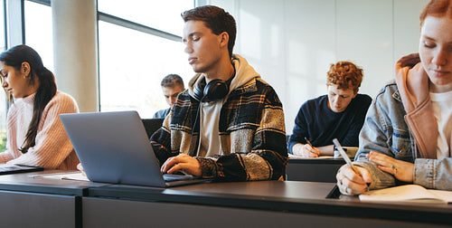 Group of young people during lecture in school