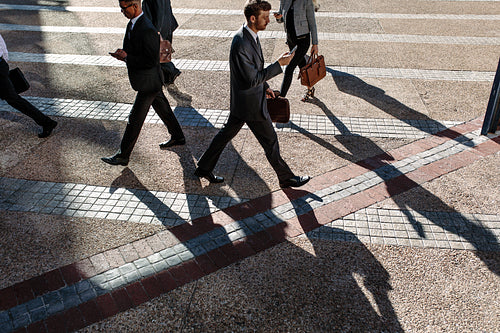 Business people walking to office in the morning on a busy street