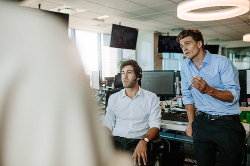 Corporate professionals having meeting in office