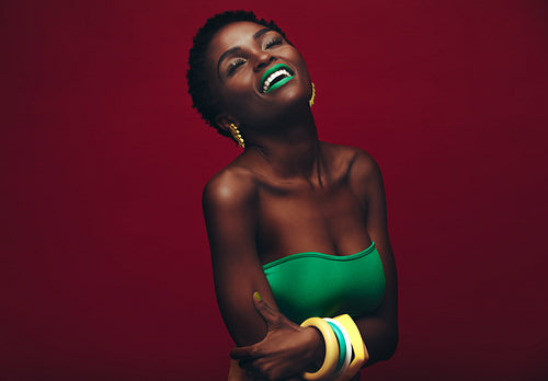 Beautiful african woman with vivid makeup