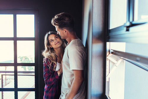 Romantic young couple looking at each other
