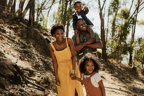 Young family enjoying their holidays in a national park